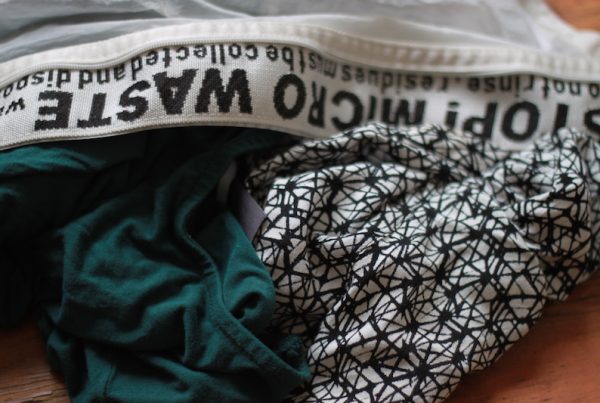 A guppy washing bag with clothes in it