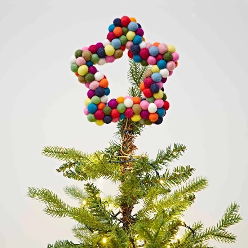 Felt star tree topper on xmas tree